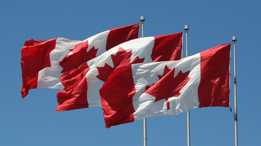 Canadian flag symbolizing national identity in context of Start-Up Visa eligibility requirements.